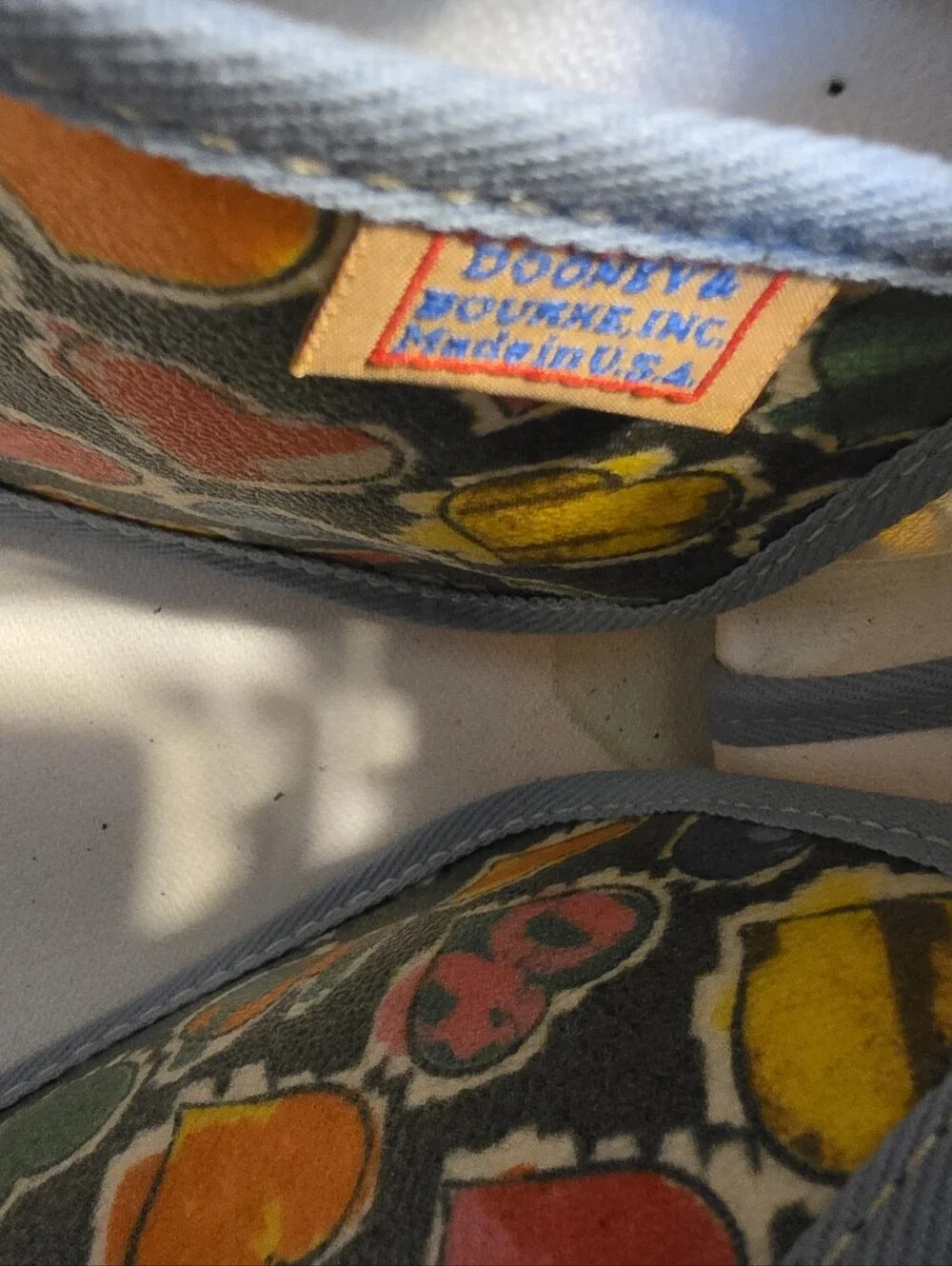 VintagecDooney & Bourke Black-Handled Multicolor Heart Print Satchel.